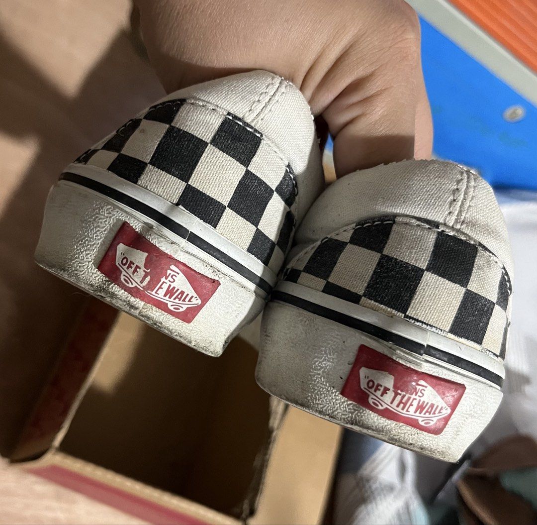 Vans Classic Slip-On Checkerboard (Category: Sneakers) located in Quezon City. Submitted by infinitineph2011 (Listing ID 1426792610, Image 3). Description: goods to! nung nilabhan ko nagfade yung black kaya nilagyan ko mano2 ung black part ng acrylic paint as you can see may konting lagpas pero d naman halata yan 🥰 pwede swap sa ganitong design dn pero size 24 or 24.5cm sana.. issue: ung nagbakbak rfs: humaba paa ko after ko manganak 🥹.