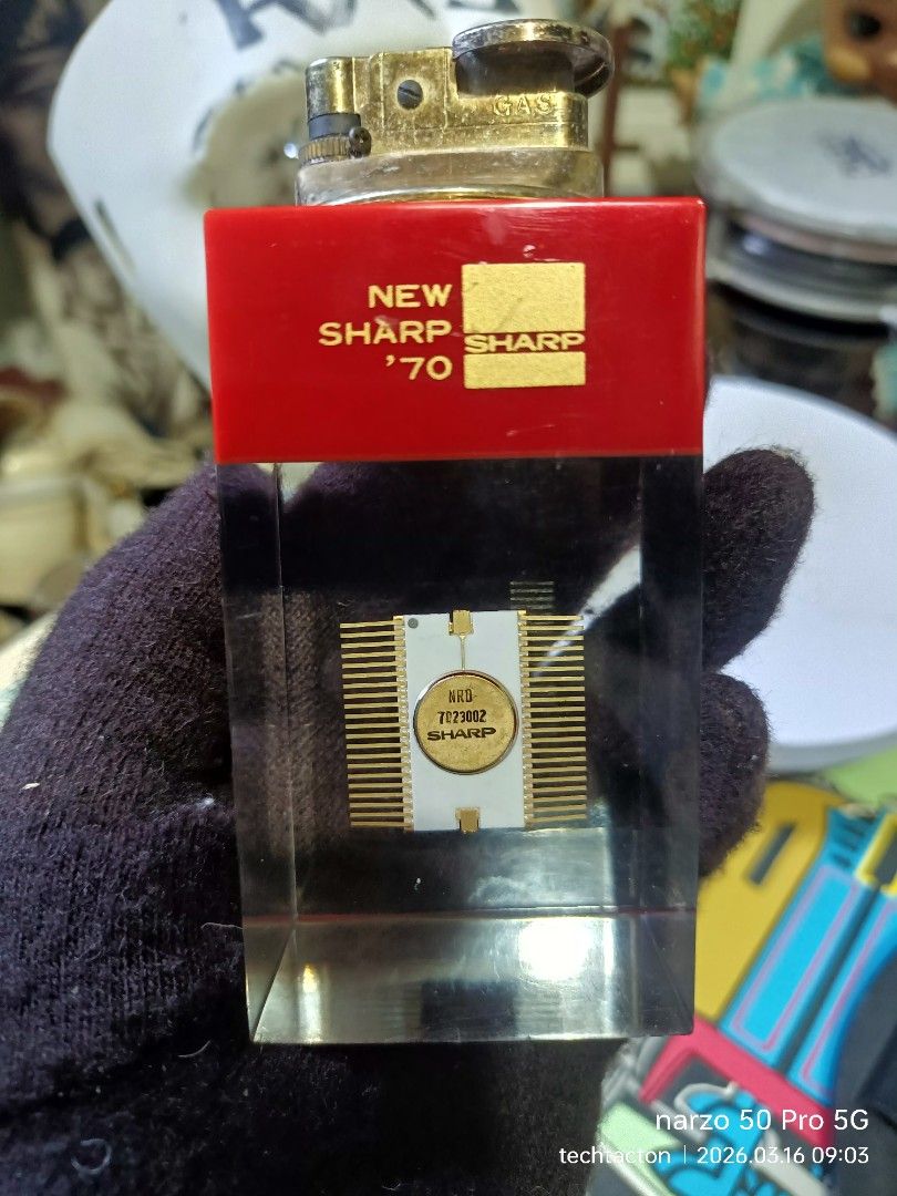 vintage 70s Sharp Calculator Micro processor (Category: Stationery & School Supplies) located in Santo Tomas. Submitted by pickers_corner (Listing ID 1426811874, Image 2). Description: vintage 70s Sharp Calculator Micro processor frozen in time in acrylic glass with a working vintage lighter need gas appox .05 to .15g recoverable gold.
