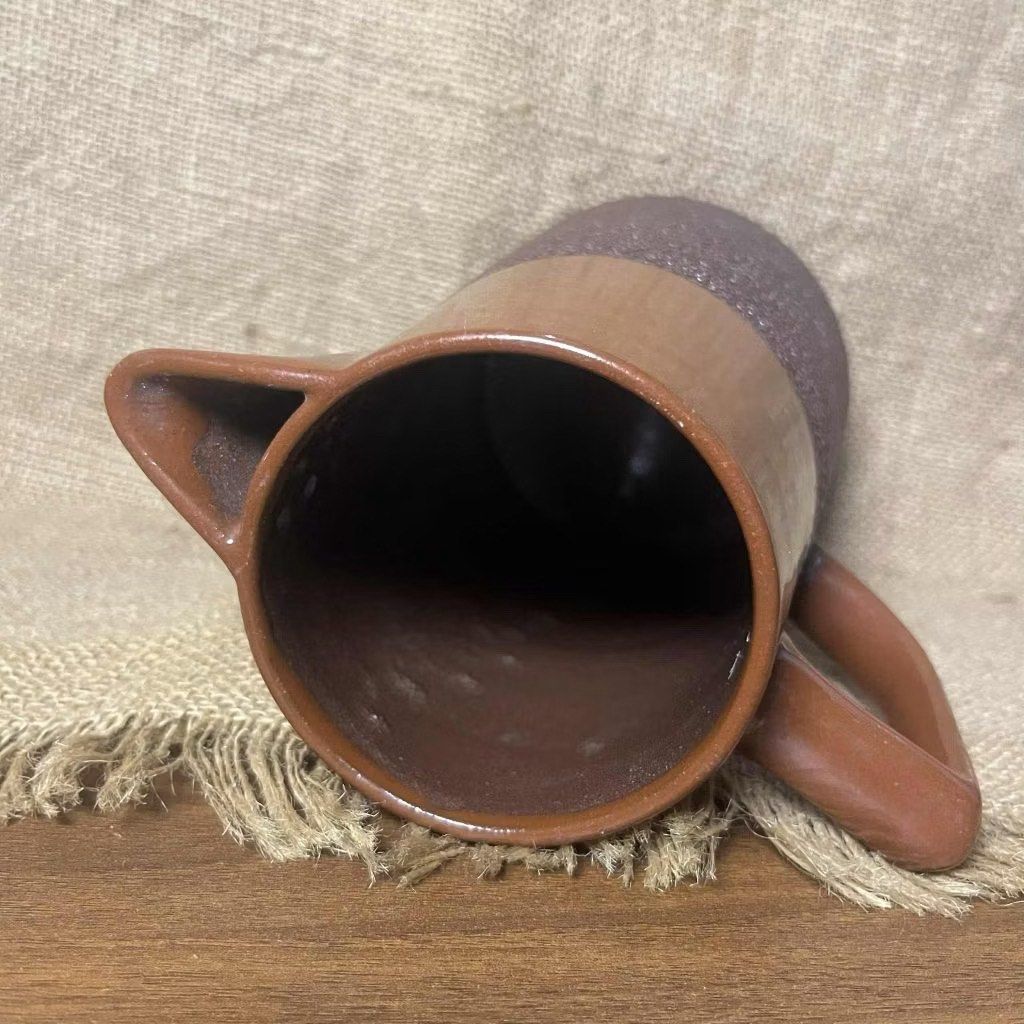Vintage Brown Ceramic Pitcher (England) (Category: Pitchers & Dispensers) located in Bulacan. Submitted by ceramicscubby (Listing ID 1426849539, Image 3). Description: Size: 4.75 D x 8.2 H in. ❗️CLOSING DOWN SALE, ALL PRICES ARE MARKED DOWN. WE WILL NOT BE ACCEPTING OFFERS LOWER THAN OUR ASKING PRICE. ❗️ •Vintage pitcher features a two-tone design with a smooth brown top and a textured, darker brown lower section. It has a handle and a spout for 