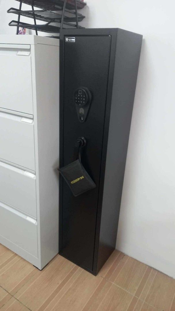 VLT Gun Safe with Digital Lock (Category: Safe) located in Caloocan City. Submitted by 5veezonlineshoppe (Listing ID 1426853248, Image 2). Description: Gun Vault Slim Type 30 x 28 x 138 cm L x W x H Hard metal alloy Wall mountable Brandnew With digital lock and fingerprint Comes with: Manual Keys Expansion battery Message for details We deliver #gunvault #gunsafe #gunsforriffle.