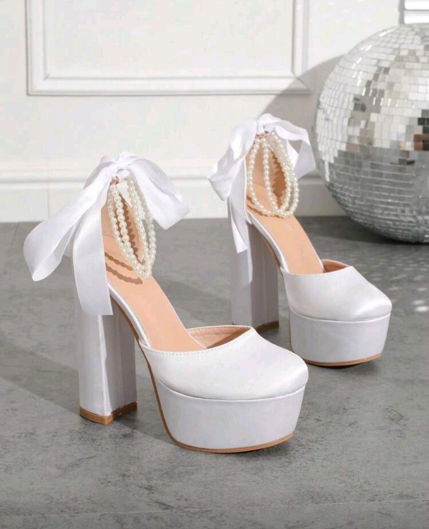 White Platform Heels with Pearl Ankle Strap (Category: Heels) located in Taguig. Submitted by chicstyle (Listing ID 1426893833, Image 1). Description: Heel high: 14 cm Foot length: 22.73 cm Platform Height: 5 cm.