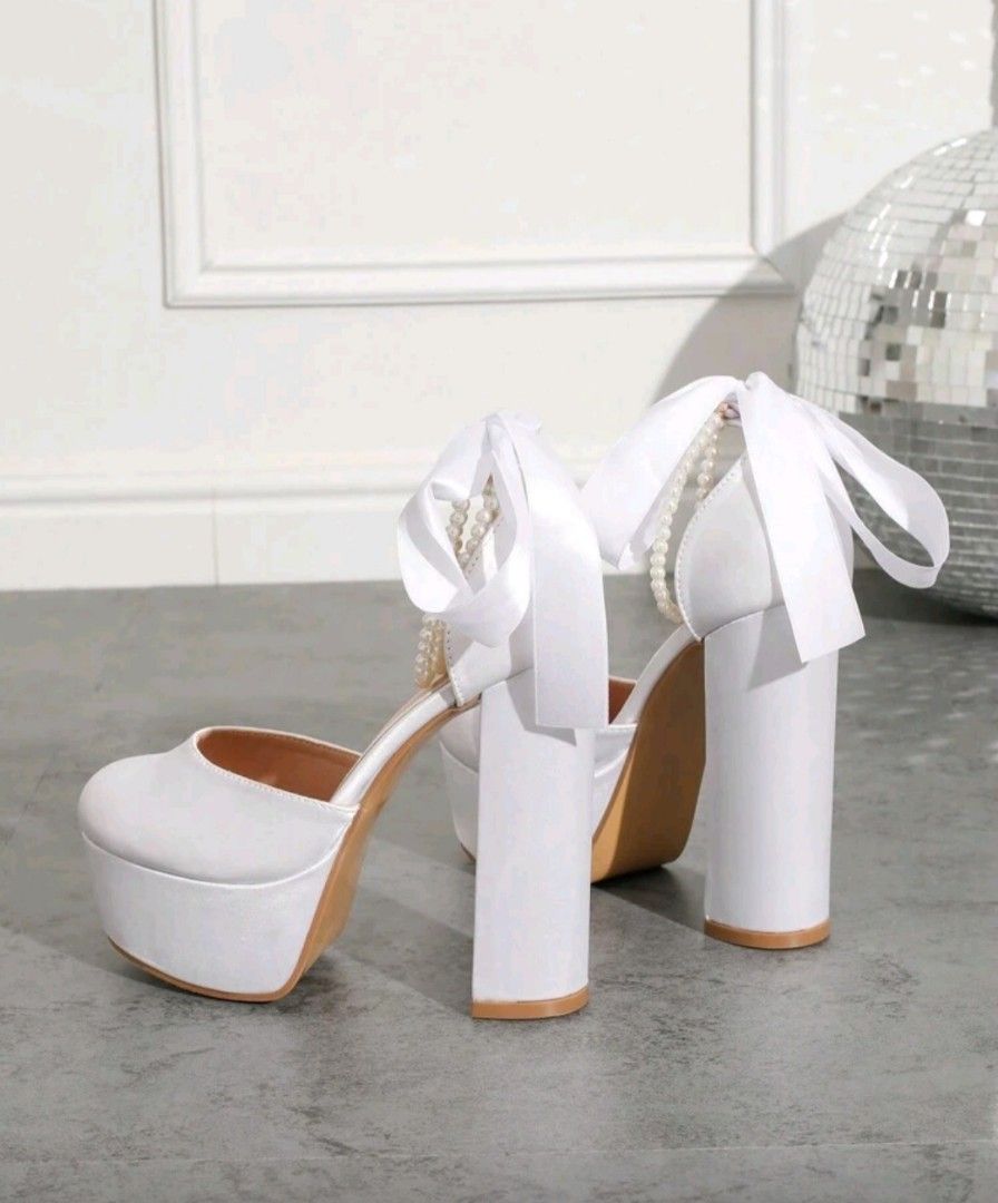 White Platform Heels with Pearl Ankle Strap (Category: Heels) located in Taguig. Submitted by chicstyle (Listing ID 1426893833, Image 2). Description: Heel high: 14 cm Foot length: 22.73 cm Platform Height: 5 cm.