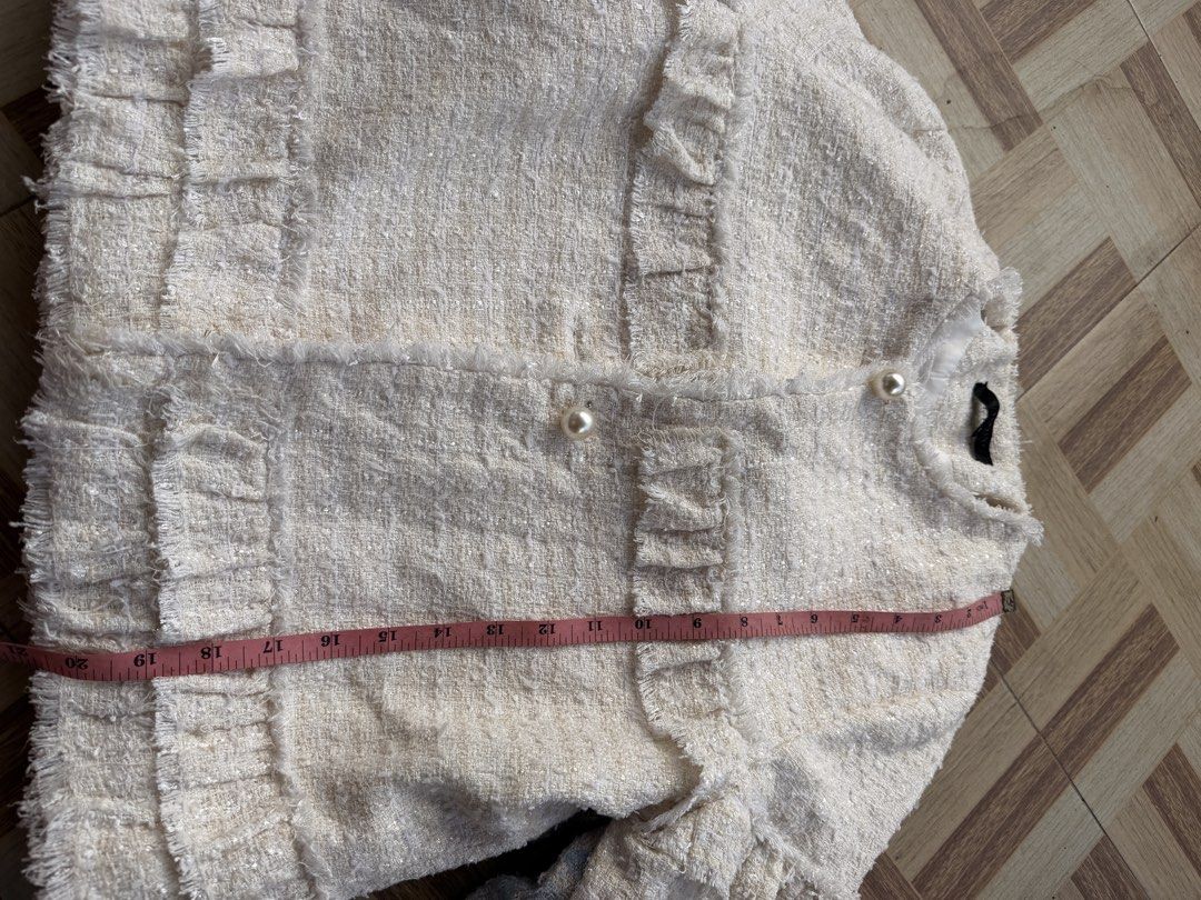 White Vietnam Tweed Ruffle Blazer (Category: Coats, Jackets and Outerwear) located in Manila. Submitted by docluttering (Listing ID 1426900441, Image 3). Description: Vietnam sizes Measurements posted .
