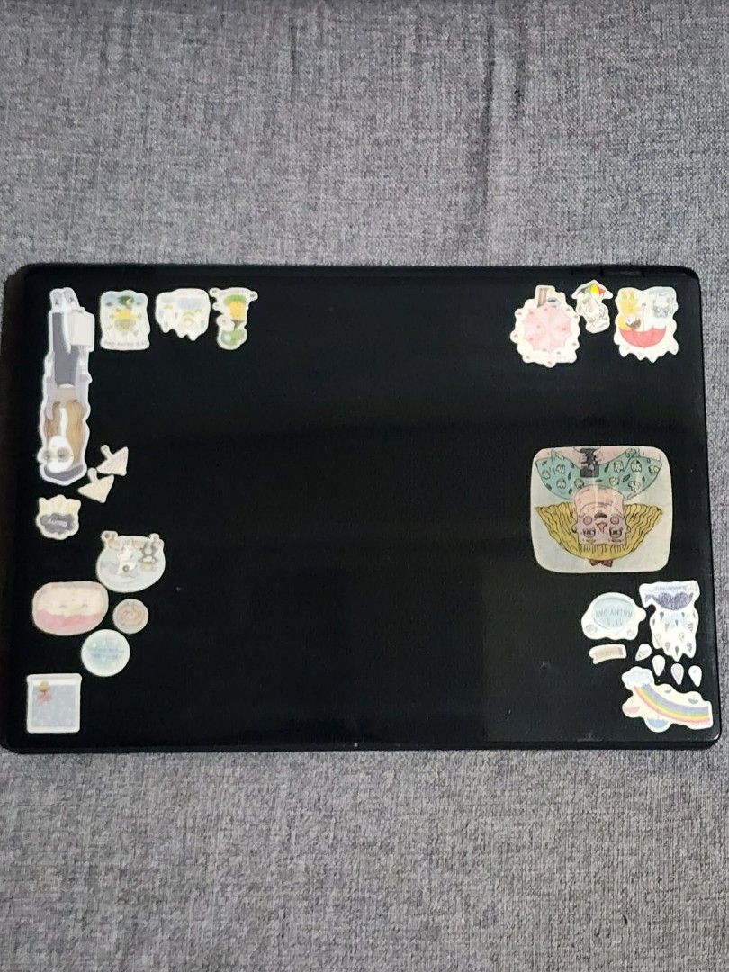 Acer ES-411 Laptop (Category: Laptops & Notebooks) located in Quezon City. Submitted by sebbysprelovedgoods (Listing ID 1426974238, Image 2). Description: Acer ES-411 laptop with Intel processor. Includes the original charger. The laptop has stickers on the lid. The model number is ES-411-C3K3. Manufactured in 2014. The laptop has a black body and keyboard. The screen is open in the images. The laptop has a VGA port, Ethernet port, HDMI port, and