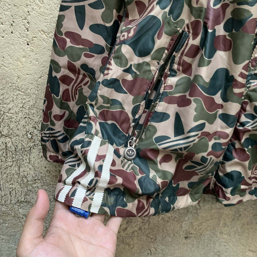 Adidas Camouflage Jacket with Hood (Category: Coats, Jackets and Outerwear) located in Taguig. Submitted by thriftstar2 (Listing ID 1427132035, Image 3). Description: W 24 L 27 10/10 color rate 10/10 condition No issue.