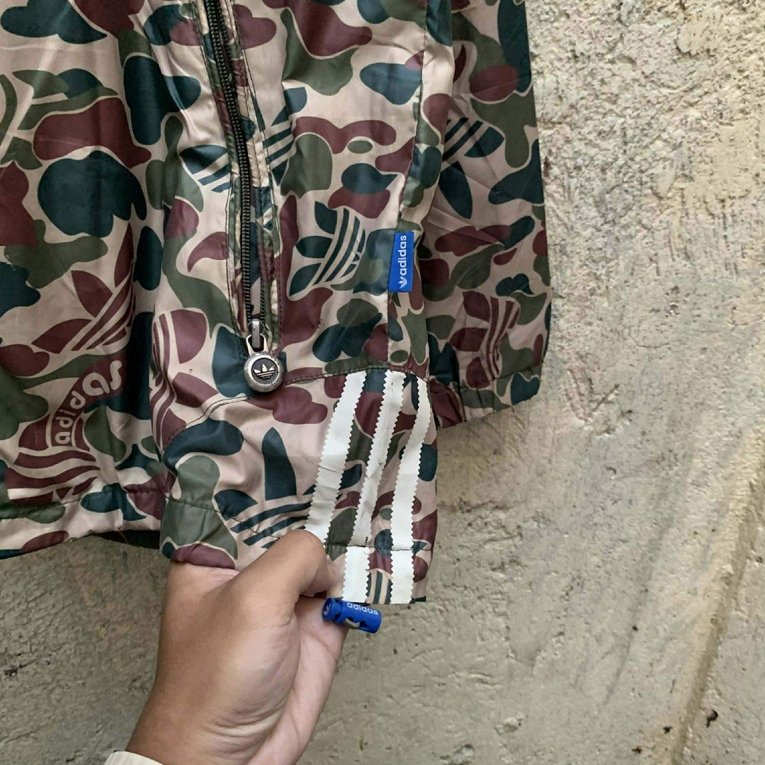 Adidas Camouflage Jacket with Hood (Category: Coats, Jackets and Outerwear) located in Taguig. Submitted by thriftstar2 (Listing ID 1427132035, Image 2). Description: W 24 L 27 10/10 color rate 10/10 condition No issue.