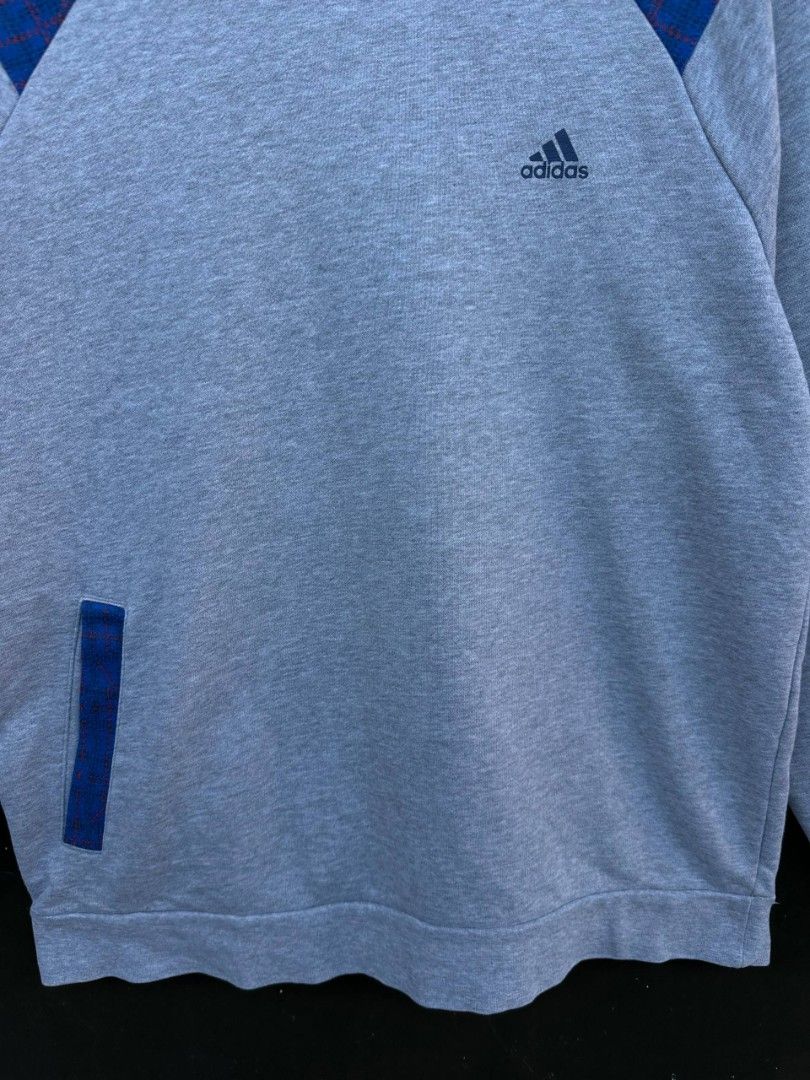 Adidas Crewneck Sweatshirt - L (Category: Coats, Jackets and Outerwear) located in Baguio. Submitted by thriftcollex (Listing ID 1427001136, Image 3). Description: - Adidas crewneck sweatshirt - Grey with blue shoulder accents - Features Adidas logo - Size: L - Measurements: Length 26.5 inches, Width 21 inches - Condition: 10/10.