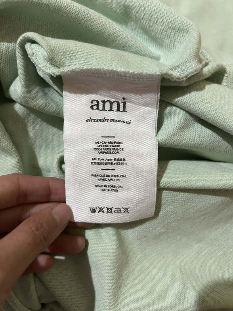 AMI Paris Green T-shirt (Category: Tshirts & Polo Shirts ) located in Bayombong. Submitted by hc_apparel0124 (Listing ID 1427095262, Image 3). Description: AUTHENTIC DIMES : 23 BY 27.5 COLOR RATE : 9.5/10 ISSUE : REPAIRED PINHOLES ( BACK LEFT SIDE ).