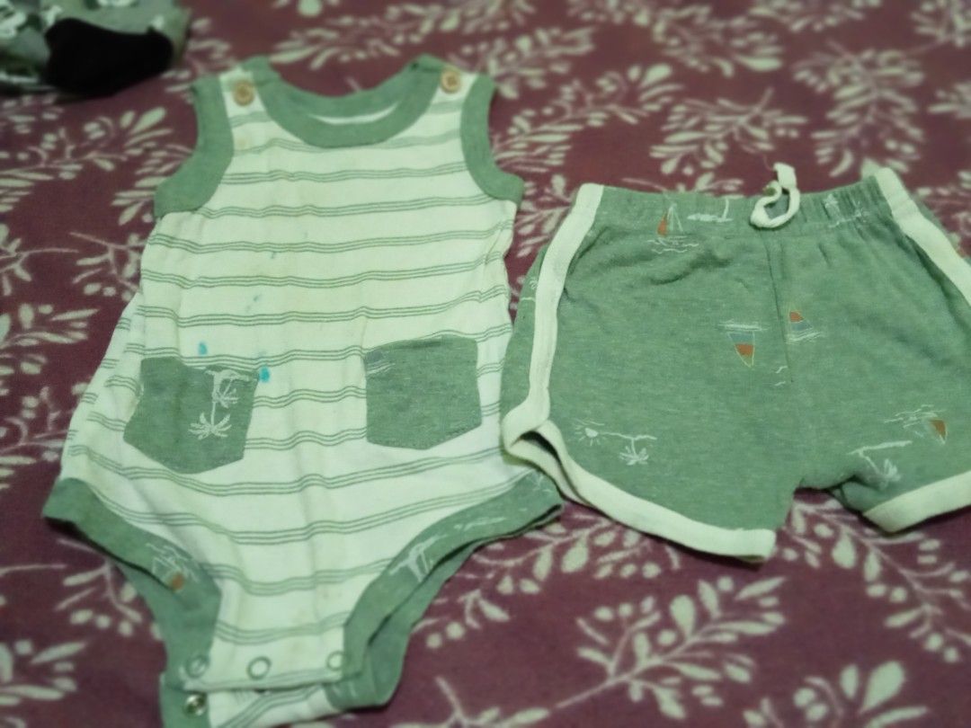 Baby Outfit Set and Mickey Mouse Pants (Category: Babies & Kids Fashion) located in Bulacan. Submitted by fujikko (Listing ID 1427055313, Image 1). Description: Adorable baby outfit set featuring a striped romper with a pocket and matching shorts. Also included is a pair of gray pants with a Mickey Mouse pattern. The outfit set has a green and white color scheme, while the pants have black cuffs. Perfect for your little one!.