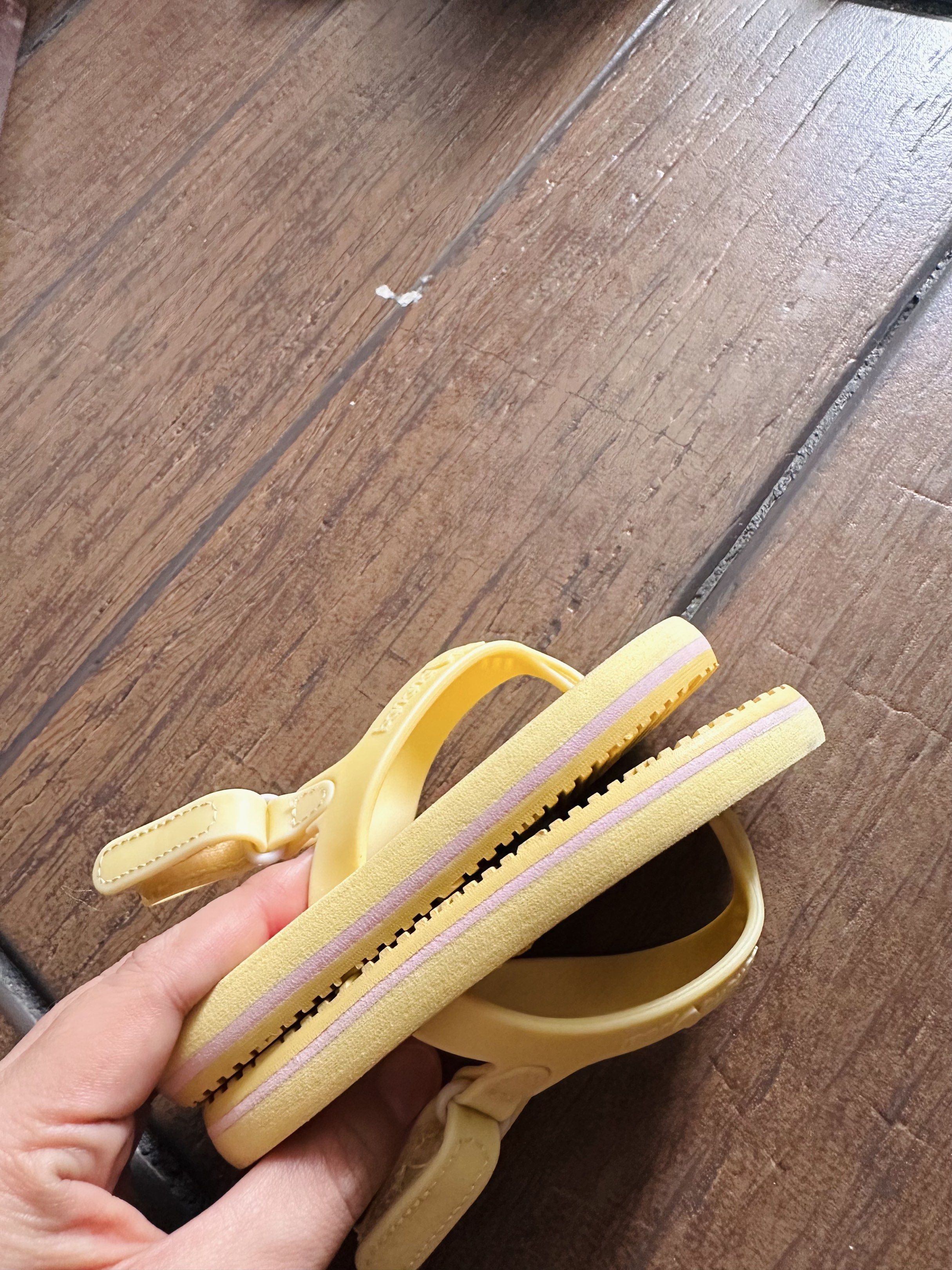Banana Peel Toddler Flip-flops (Category: Babies & Kids Fashion) located in Calamba. Submitted by michi.194 (Listing ID 1427124028, Image 3). Description: Banana Peel Toddler Swimming beach slipper Like new condition Used it 2-3 times beach / swimming - Banana Peel flip-flops - Yellow base with fun pineapple prints - Features a heel strap and a thong strap - Comfortable and stylish for kids - Ideal for summer adventures.