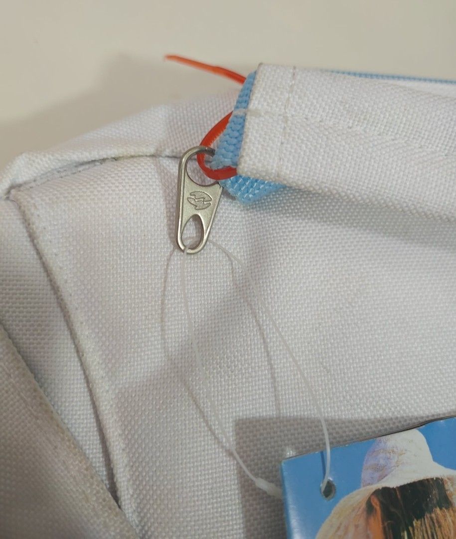 Billabong Australia Surfside Polyester Backpack (Category: Backpacks) located in Naga. Submitted by princessta62477 (Listing ID 1427082586, Image 2). Description: Billabong backpack features a white exterior with blue accents and a hibiscus flower design. It includes a zipper closure and a tag. The backpack is made of Surfside Polyester. The design includes the Billabong Australia logo. The backpack has a shoulder strap with the Billabong logo an