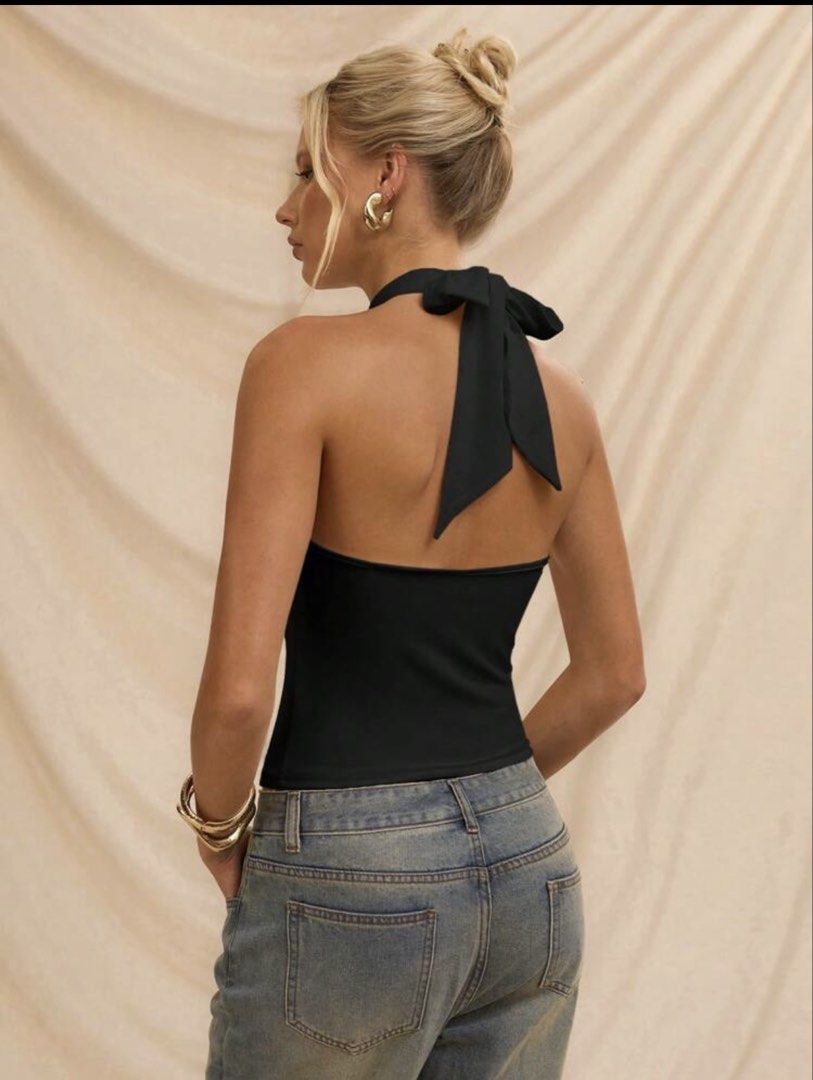 Black Halter Top with Gold Detail [S] (Category: Sleeveless) located in Caloocan City. Submitted by ctrl12 (Listing ID 1427031982, Image 2). Description: - Black halter top with gold detail - Size: S - Flattering halter design - Gold accent MOP: GCash MOD: Lalamove / J&T.