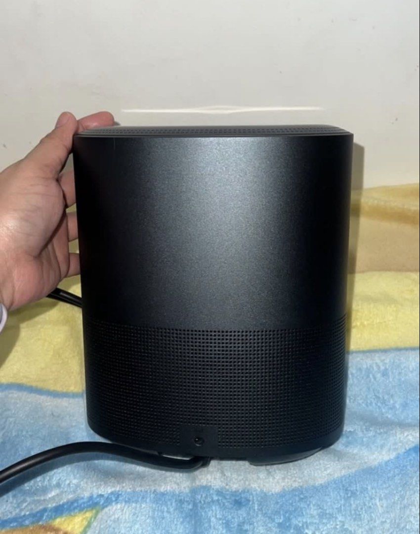 Bose Home Speaker 500 (Category: Soundbars, Speakers & Amplifiers) located in Mandaluyong City. Submitted by magnus323 (Listing ID 1427033274, Image 3). Description: Bose Home Speaker 500 in black. Features a built-in display and control buttons on top. Includes a power cable. The speaker has a cylindrical design with a perforated lower section. The Bose logo is visible on the front. No box, speaker and cable only. Bought brand new at P24,900. Th