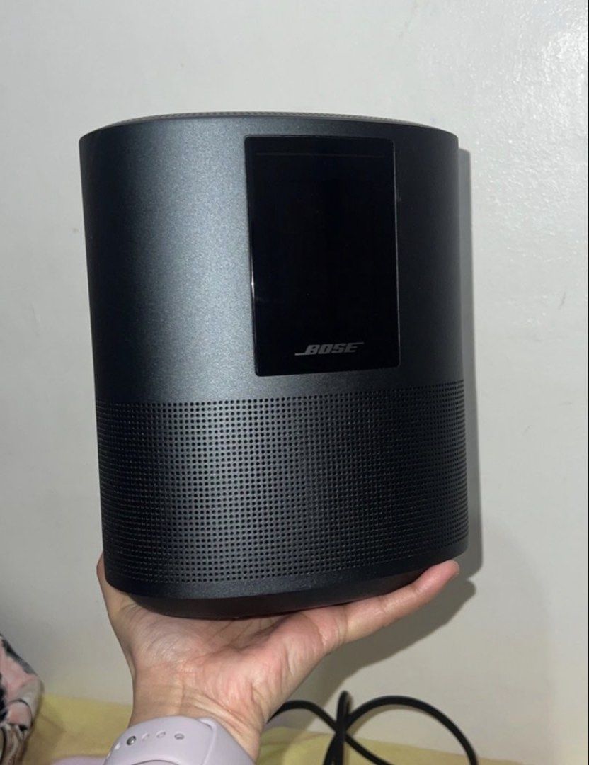 Bose Home Speaker 500 (Category: Soundbars, Speakers & Amplifiers) located in Mandaluyong City. Submitted by magnus323 (Listing ID 1427033274, Image 1). Description: Bose Home Speaker 500 in black. Features a built-in display and control buttons on top. Includes a power cable. The speaker has a cylindrical design with a perforated lower section. The Bose logo is visible on the front. No box, speaker and cable only. Bought brand new at P24,900. Th