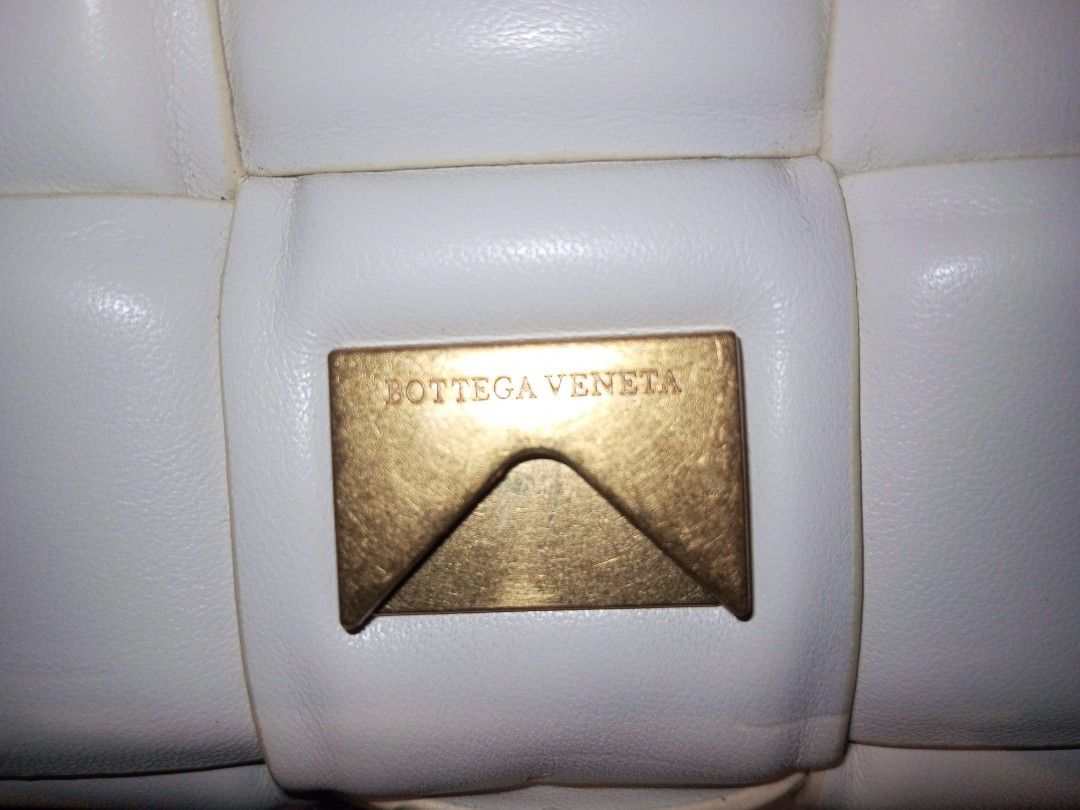 Bottega VenetaPadded cassette bag (Category: Luxury Bags & Wallets) located in Manila. Submitted by agenttin (Listing ID 1426019469, Image 3). Description: The product shown is a Bottega Veneta Padded Cassette bag, featuring the brand's iconic Intrecciato woven design in luxurious nappa leather with a triangle buckle. .