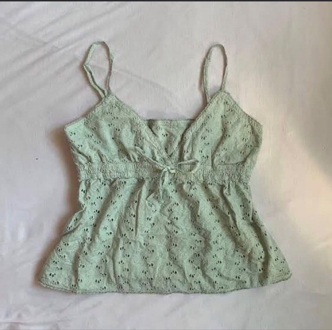Brandy Melville Edith Sage Green Top (Category: Sleeveless) located in San Mateo. Submitted by declutternao (Listing ID 1427135420, Image 1). Description: matcha top.