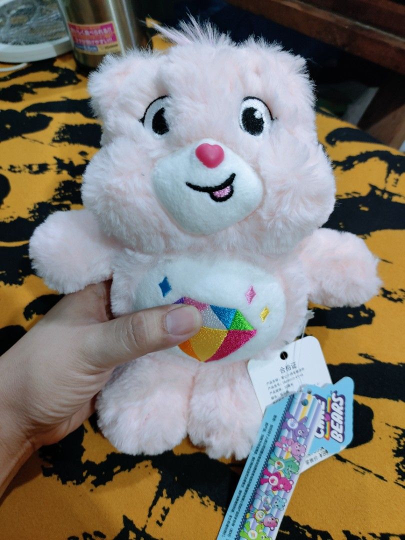 CARE BEARS UNLOCK THE MAGIC TRUE HEART BEAR (Category: Plushies & Soft Toys) located in Manila. Submitted by imperialfeline (Listing ID 1427109068, Image 1). Description: from hk box... with tags.