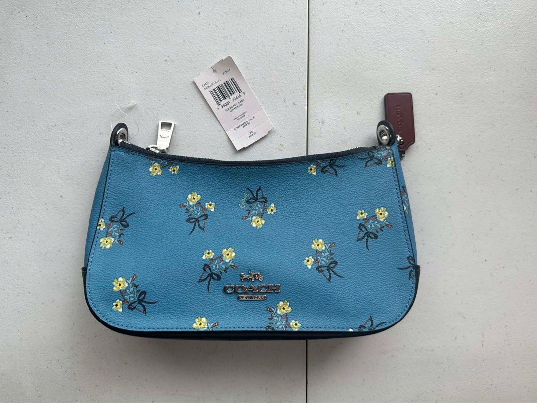 Coach Floral Print Shoulder Bag (Category: Luxury Bags & Wallets) located in Manila. Submitted by theclosetcycle (Listing ID 1426988119, Image 2). Description: ✨ Never used, no defects ✨ tags not attached ✨ no dust bag.