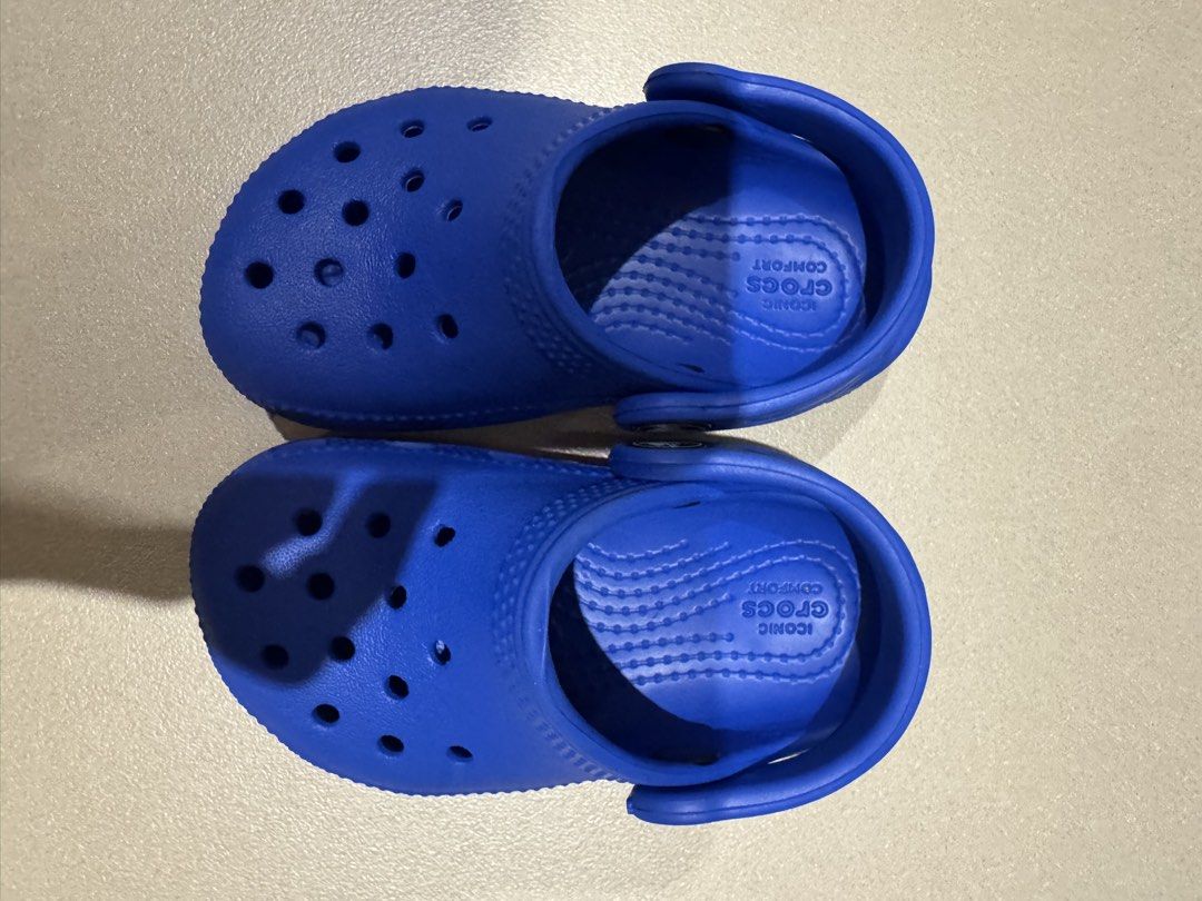Genuine Crocs Classic Clogs - Blue - Toddler Size 6 (Category: Babies & Kids Fashion) located in Quezon City. Submitted by Tasi671 (Listing ID 1427112983, Image 2). Description: Authentic Crocs bought in America 🇺🇸 Lightly used but low brand new SRP 2,095.