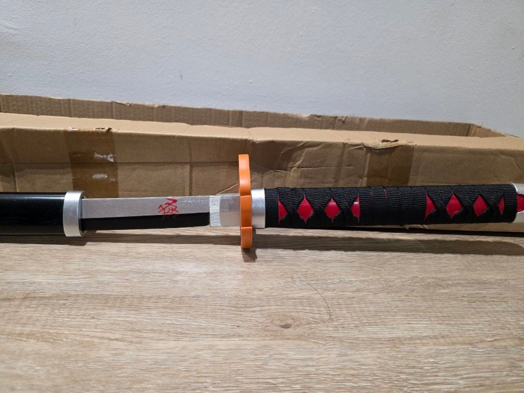 Demon Slayer wooden sword with fire hashira emblem, Hobbies & Toys ...