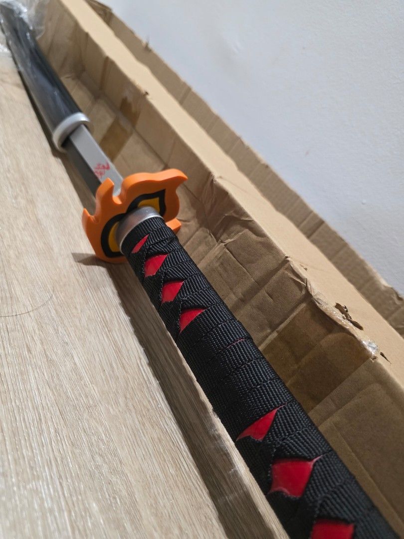 Demon Slayer wooden sword with fire hashira emblem, Hobbies & Toys ...
