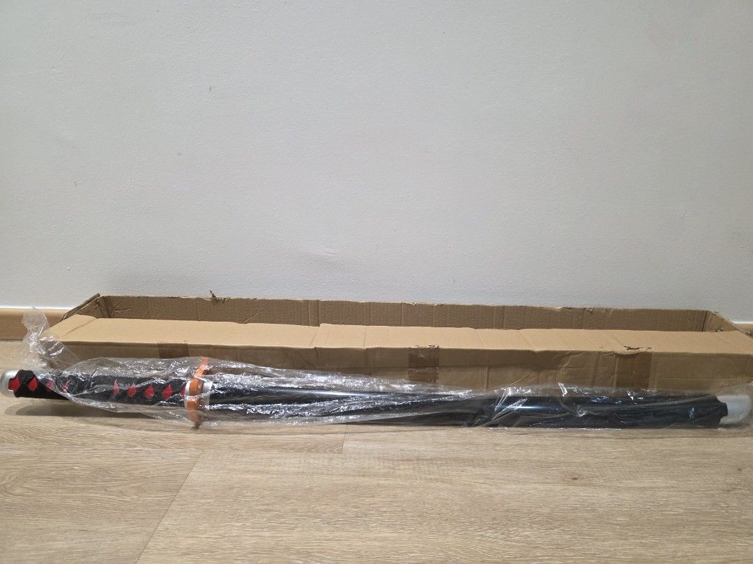 Demon Slayer wooden sword with fire hashira emblem, Hobbies & Toys ...