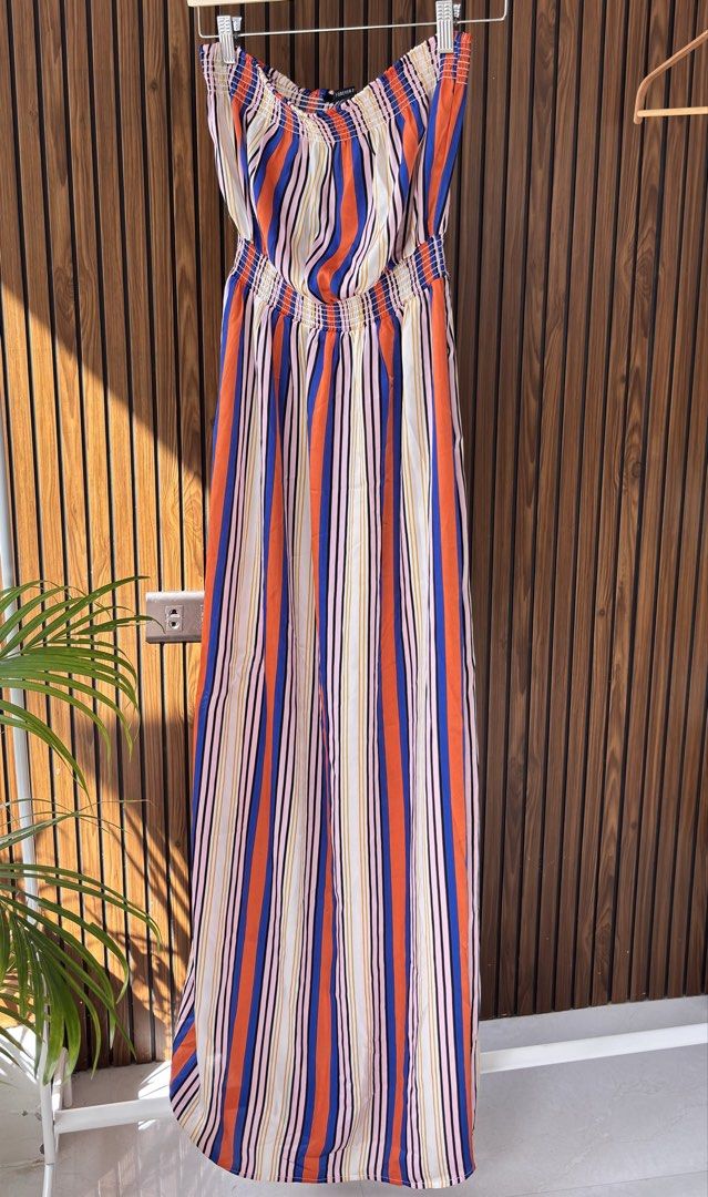 FOREVER 21 Striped Strapless Maxi Dress (Category: Dresses) located in Cavite. Submitted by declutteringmama12 (Listing ID 1421062612, Image 1). Description: Forever 21 maxi dress Size: S (fits up to Medium) • Features a vibrant striped pattern (orange, blue, pink, white) • Strapless design • Elasticated bust and waist for a comfortable fit • Ideal for beach days or casual outings 🛍️ RFS: Closet reset after becoming a mama — hoping this finds a 