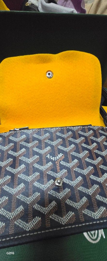 GOYARD PLUMET POUCH WALLET (Category: Luxury Bags & Wallets) located in Manila. Submitted by luxxcorner4less (Listing ID 1426980673, Image 3). Description: Authentic Goyard blue and redwine available colors wallet on chain flap snap closure palladium hardware 3 separate compartments withe zipper section and card slots length- 20cm hight- 14cm complete inclusions.