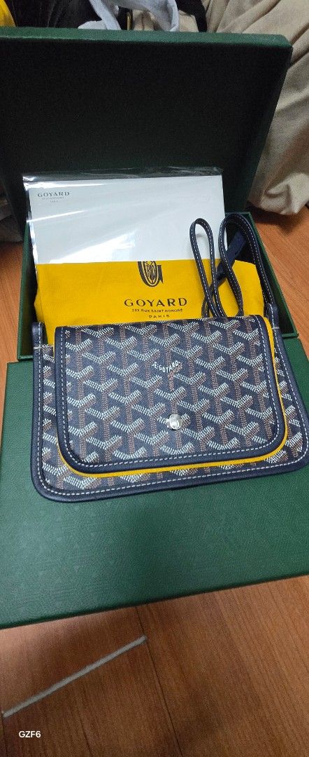 GOYARD PLUMET POUCH WALLET (Category: Luxury Bags & Wallets) located in Manila. Submitted by luxxcorner4less (Listing ID 1426980673, Image 1). Description: Authentic Goyard blue and redwine available colors wallet on chain flap snap closure palladium hardware 3 separate compartments withe zipper section and card slots length- 20cm hight- 14cm complete inclusions.