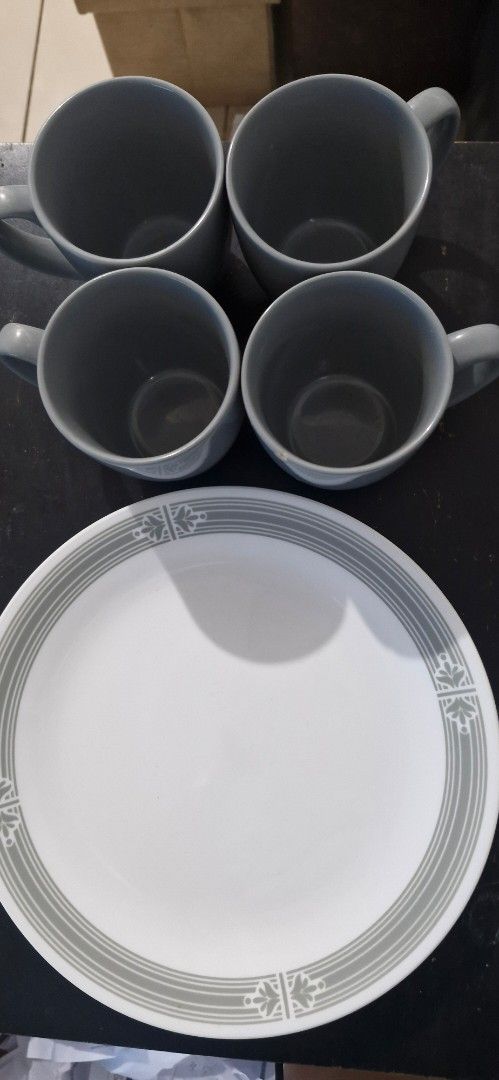 Gray Mugs and Plates Set (Category: Dinnerware & Cutlery) located in Antipolo. Submitted by angel18yna (Listing ID 1427028818, Image 1). Description: Selling my rarely used Corelles Used once or twice only Corelle Prairie Garden Gray (not complete set) 4 Dinner Plates 4 Mugs (1 Mug has a small chip see last photo).