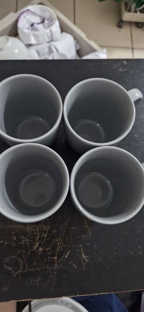 Gray Mugs and Plates Set (Category: Dinnerware & Cutlery) located in Antipolo. Submitted by angel18yna (Listing ID 1427028818, Image 3). Description: Selling my rarely used Corelles Used once or twice only Corelle Prairie Garden Gray (not complete set) 4 Dinner Plates 4 Mugs (1 Mug has a small chip see last photo).
