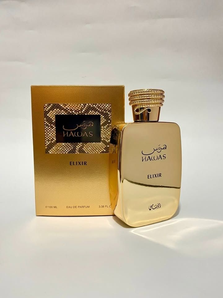 Hawas Elixir Perfume 100ml (Category: Fragrance & Deodorants) located in Taguig. Submitted by minimaliscent (Listing ID 1427043410, Image 3). Description: Hawas Elixir perfume in a gold-colored bottle with a matching box. The box features a snake-skin pattern and the perfume name. The bottle has a gold cap. The perfume is 100ml and is an Eau de Parfum. The box also has the brand name and the word "Elixir". Top Notes: Bergamot, Grapefruit, Pink Pe