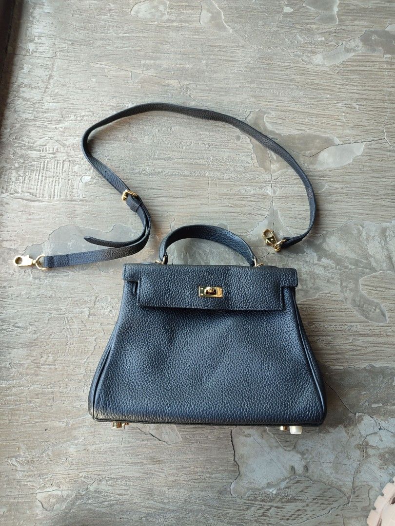 Hermes Kelly Handbag Black (Category: Luxury Bags & Wallets) located in Puerto Princesa. Submitted by thriftedsoulsy2k (Listing ID 1426960946, Image 2). Description: hermes kelly handbag with sling Excellent condition good as new no issue.