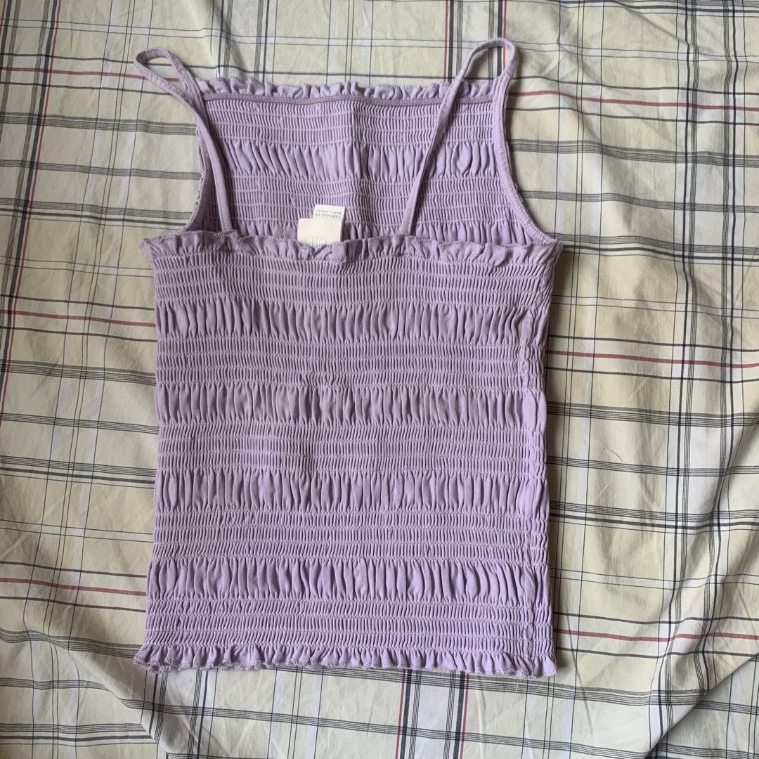 H&M Smocked Tank Top Lilac (Category: Sleeveless) located in Paranaque City. Submitted by dalgicheetos (Listing ID 1427001556, Image 2). Description: fits XS-M worn once rfs: impulsive buying.