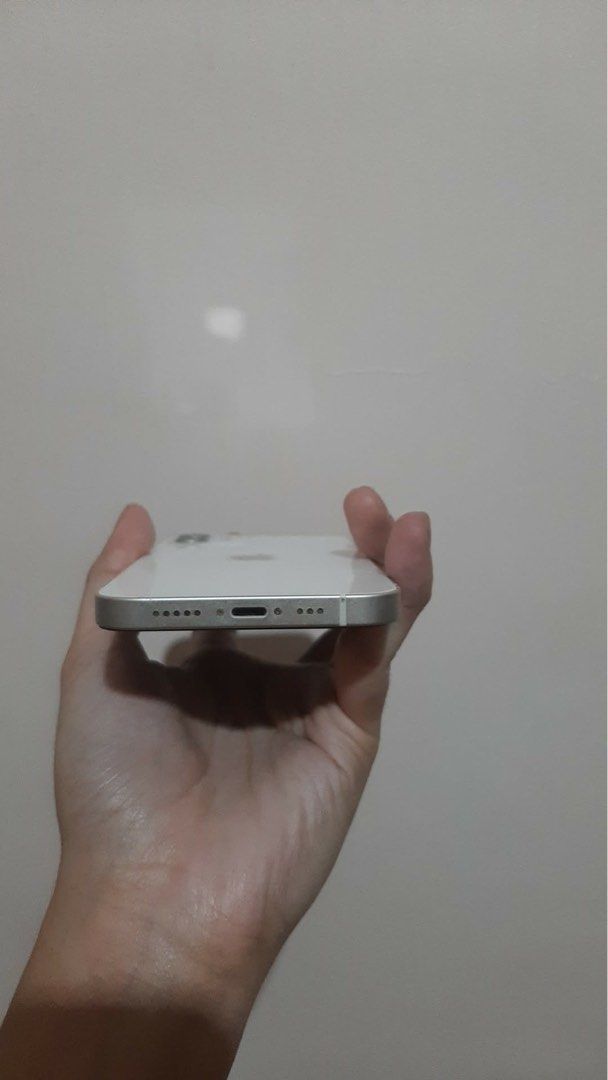 iPhone 12 - 128 GB white (Category: iPhone 12 Series) located in Daraga. Submitted by nursecutie (Listing ID 1427095296, Image 3). Description: iPhone 12 (White, 128 GB) •no scratches, no dents, no software/hardware issues • maximum capacity: 71% • never been refurbished / repaired • shipping thru J&T price slightly negotiable, DM me for inquiries! .