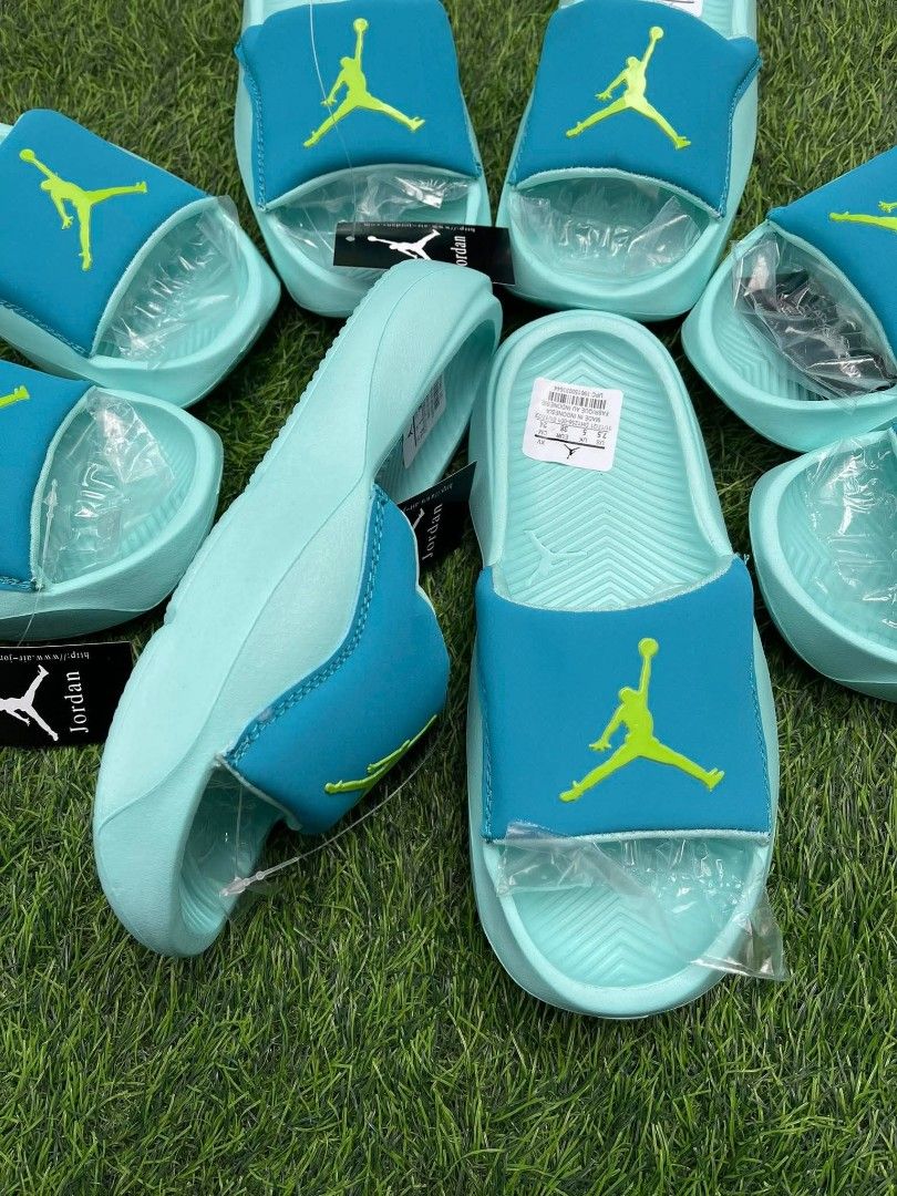 Jordan Hydro 7 Slide Sandals (Category: Sandals) located in Taytay. Submitted by 1920cartel.ph (Listing ID 1427095855, Image 1). Description: Authentic Jordan Hydro 7 slide sandals. Features a teal and green color scheme with the iconic Jumpman logo. The sandals appear to be new, with tags still attached. Comfortable and stylish footwear perfect for casual wear or post-workout recovery. Available in multiple sizes..