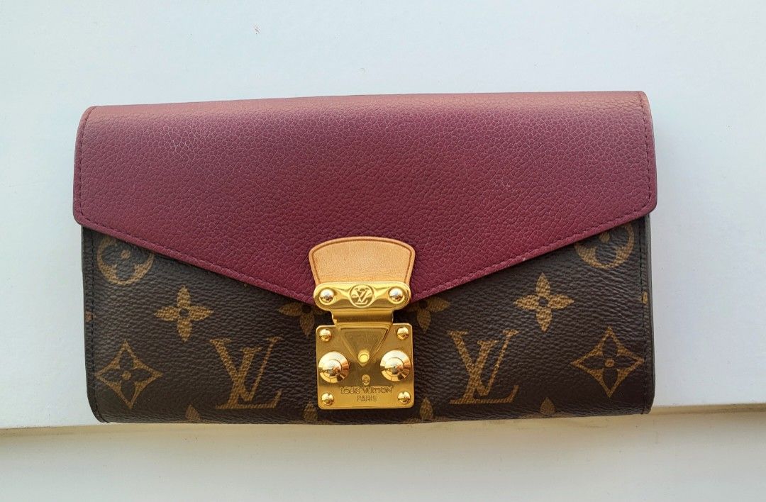 Louis Vuitton Pallas Wallet Large (Category: Luxury Bags & Wallets) located in Mandaluyong City. Submitted by amps.ae (Listing ID 1427123044, Image 2). Description: Guaranteed Authentic with Entrupy Condition : 9/10 very min signs of use. No major flaw. Very spacious can fit iphone promax Inclusions : like new box and paperbag, will add chain to convert to Wallet on chain Note : With Initials.
