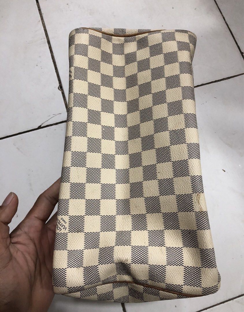 Louis Vuitton Speedy 30 Damier Azur (Category: Luxury Bags & Wallets) located in Montevista. Submitted by rdthriftshub (Listing ID 1427035403, Image 3). Description: Louis Vuitton Speedy 30 handbag in Damier Azur canvas. Features leather handles and trim with gold-tone hardware. The interior includes a pocket and a date code. The bag has a zipper closure and is made in France. Includes the Louis Vuitton logo on the exterior..