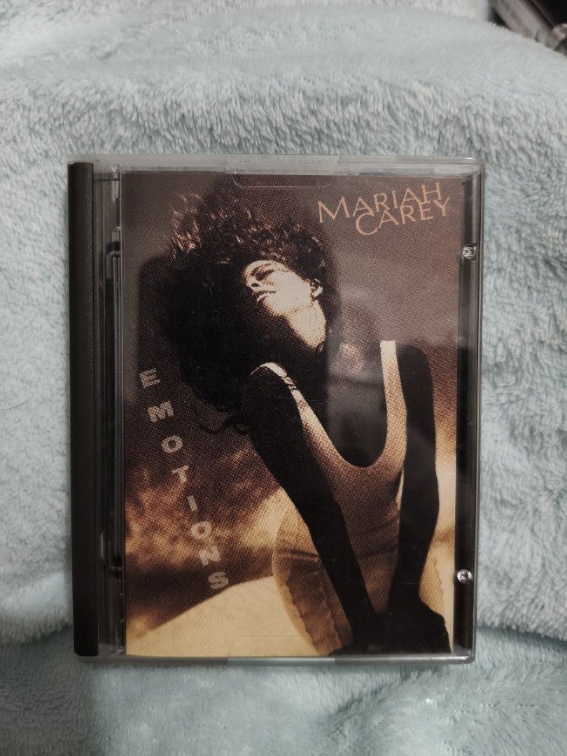 Mariah Carey - Emotions Mini disc (Category: CDs & DVDs) located in Pateros City. Submitted by randomsheesh (Listing ID 1426973199, Image 1). Description: Selling my pre-loved Mariah Carey "Emotions" album on Mini Disc format. Ito ang kanyang second studio album na naglalaman ng mga kantang nagpasikat lalo sa kanyang sikat na "whistle register"! Details: Format: Mini Disc Genre: Pop / R&B / Soul Release Year: 1991 Artist: Mariah Carey Tracklist H