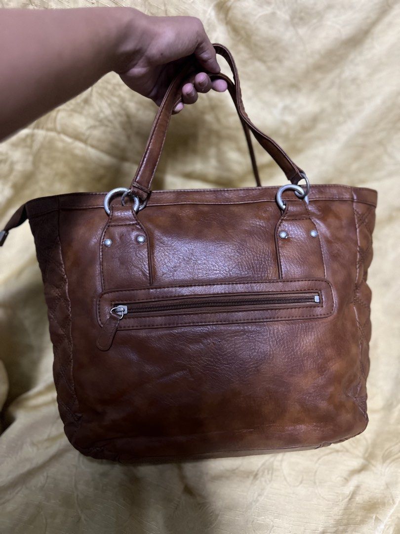 Nicole Miller Brown Tote Bag (Category: Tote Bags) located in Manila. Submitted by moon_2026 (Listing ID 1427026308, Image 2). Description: Nicole Miller bag you can check why is the original price of this bag, what you see is what you get super nice nya!!🩷 .
