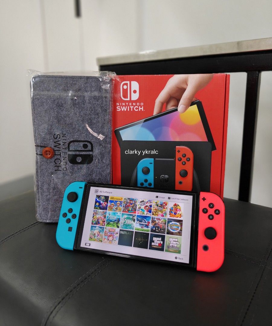 Nintendo Switch Oled Redblue with Free Games (Category: Nintendo) located in Manila. Submitted by nswitchgear (Listing ID 1427025989, Image 3). Description: Nintendo Switch OLED with Free Games ₱11,499 FREE acess to my Paid games Legit purchase not Jailbreak. Used item but in Good/Best condition Can give 7 Days personal Warranty for peace of mind. -Doon po tayo sa kaya tayong issupport, dont settle for less. Comes w/ Complete Package w/ pouch (Bo