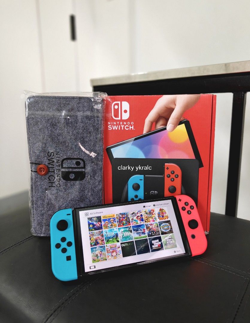 Nintendo Switch Oled Redblue with Free Games (Category: Nintendo) located in Manila. Submitted by nswitchgear (Listing ID 1427025989, Image 2). Description: Nintendo Switch OLED with Free Games ₱11,499 FREE acess to my Paid games Legit purchase not Jailbreak. Used item but in Good/Best condition Can give 7 Days personal Warranty for peace of mind. -Doon po tayo sa kaya tayong issupport, dont settle for less. Comes w/ Complete Package w/ pouch (Bo