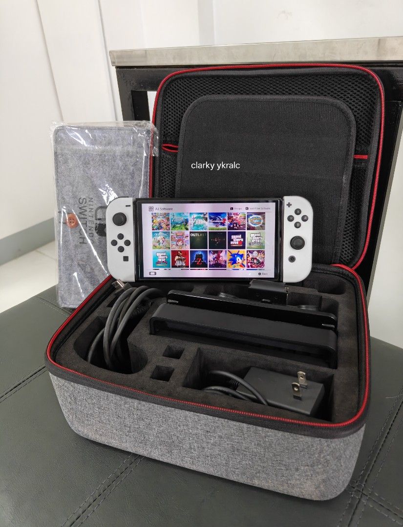 Nintendo Switch OLED with Free Games (Category: Nintendo) located in Manila. Submitted by nswitchgear (Listing ID 1427028932, Image 2). Description: Nintendo Switch OLED with Free Games ₱10,999 FREE acess to my Paid games Legit purchase not Jailbreak. Used item but in Good/Best condition Can give 7 Days personal Warranty for peace of mind. -Doon po tayo sa kaya tayong issupport, dont settle for less. Comes w/ Complete Package w/ pouch (Travelbag,