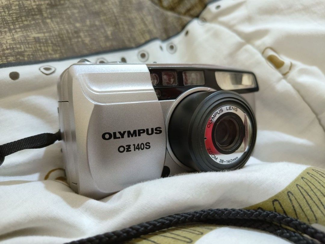 OLYMPUS OZ 140S (Category: Cameras) located in Manila. Submitted by raaiiinn (Listing ID 1427132651, Image 3). Description: Olympus OZ‑140S powers on zoom working shutter working flash (all types works) untested with film sold as is..