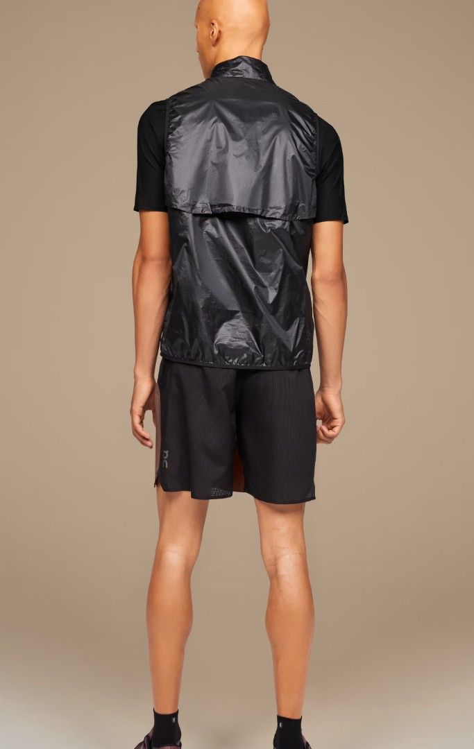 On Running Padded Cold Weather Running Vest (Category: Vests) located in Pasig City. Submitted by psg2019 (Listing ID 1426665726, Image 2). Description: Black vest from On cloud Running. Features a full zip closure, a stand-up collar, and the On Running logo on the chest. The vest has a lightweight, water-resistant material. Size L. Made in Vietnam. reflectorized logo 2000+ship pasig location 📍.