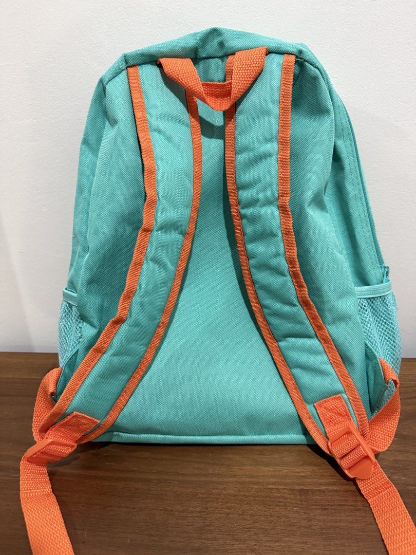 Peppa Pig Dino Stomp Backpack (Category: Babies & Kids Fashion) located in Quezon City. Submitted by declutterinclutter (Listing ID 1426977409, Image 2). Description: - Peppa Pig Dino Stomp design - Main compartment - Front zippered pocket - Adjustable orange straps - Side mesh pockets - Teal zipper - Teal back.