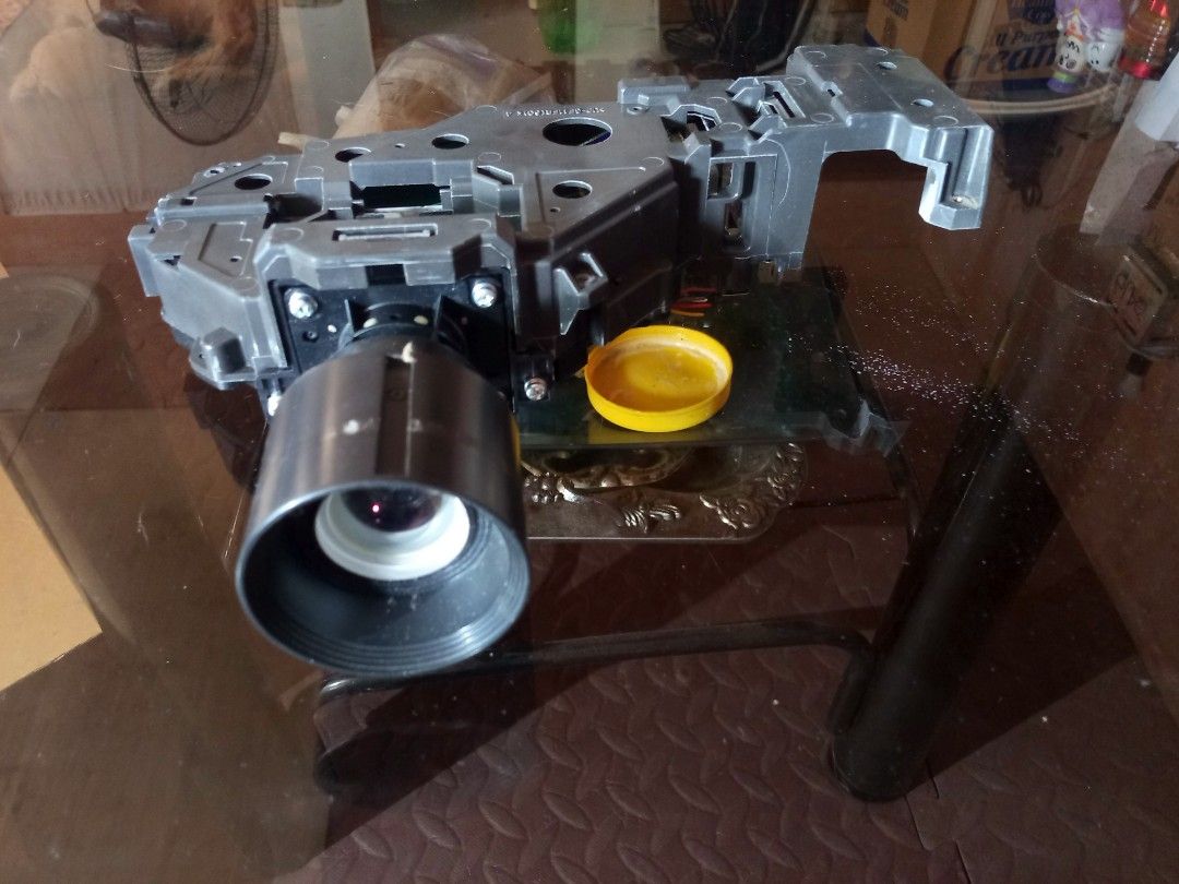 Projector Lens Module H376 (Category: Projectors) located in Marikina City. Submitted by picker_seller17 (Listing ID 1426979044, Image 2). Description: - Projector lens module, model H376 - Includes lens, internal components, and wiring - Black housing - Model number visible on sticker - Item is as shown in the images.