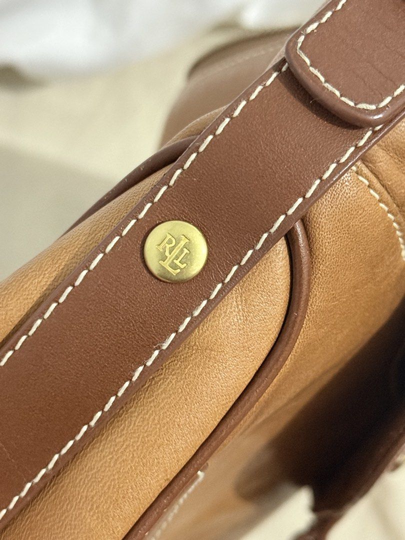 Ralph Lauren Vintage Saddle Bag (Category: Luxury Bags & Wallets) located in Manila. Submitted by venellopy.collection (Listing ID 1426994081, Image 3). Description: -Leather hobo-style bag -brass lobster-claw clasp on the front flap -Pockets (front & inside) -in good condition Ship via flash express 📍Nueva Ecija.