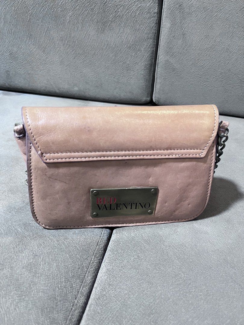 Red Valentino Crossbody Bag (Category: Luxury Bags & Wallets) located in Manila. Submitted by calmocean-f675cc (Listing ID 1427075014, Image 1). Description: Red Valentino Sling bag Authentic 2500 .