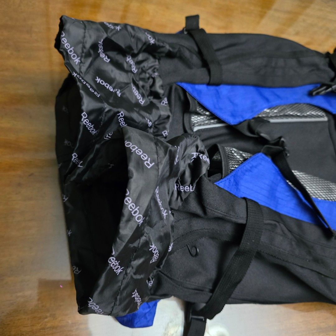 Reebok Hiking/Trekking Backpack (Category: Backpacks) located in Manila. Submitted by artic1212 (Listing ID 1427020894, Image 3). Description: [SELLING] RFS: never used, decluttering Features: Black and royal blue colorway with Reebok branding Large main compartment with ample storage Front zippered pocket for easy access to essentials Dual mesh side pockets (ideal for water bottles) Multiple compression straps to secure your load Padded back pan